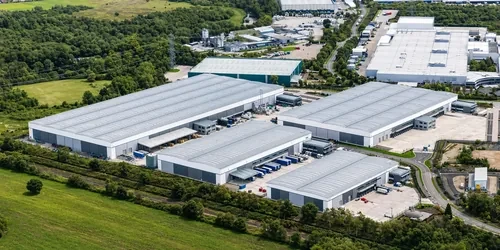 Aerial view of a major United Kingdom logistics and warehousing hub with motorway access